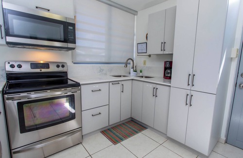 Ensenada House | Beachfront in gated community with patio, balcony, pool, close to all in Rincón