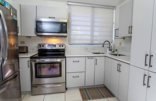 Ensenada House | Beachfront in gated community with patio, balcony, pool, close to all in Rincón