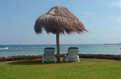 Puerto Aventuras Condo | Beachfront Location with 2 Pools; Private Terrace