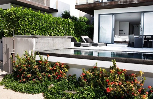 Fryes Beach Villa | Beachfront modern comber townhouse with pool at Ffryes Beach