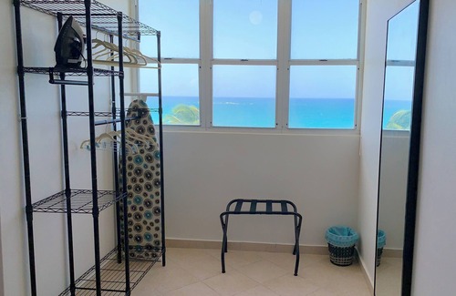 San Juan Apartment | Beachfront Oceanview 2-suite condo with balcony, AC, WiFi, Pool, Fitness Room