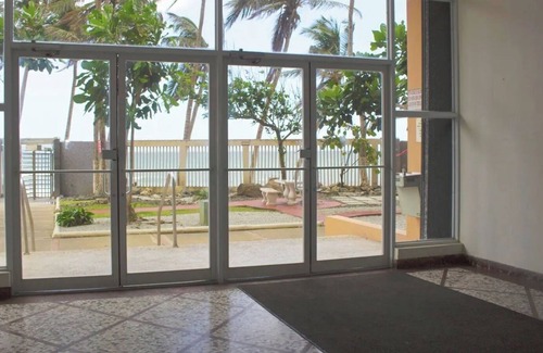San Juan Apartment | Beachfront Oceanview 2-suite condo with balcony, AC, WiFi, Pool, Fitness Room