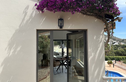 Arnella Villa | Beachfront villa with views of El Portet Bay