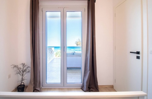 Alykes House | Beachfront wooden house "Vounaraki 4"