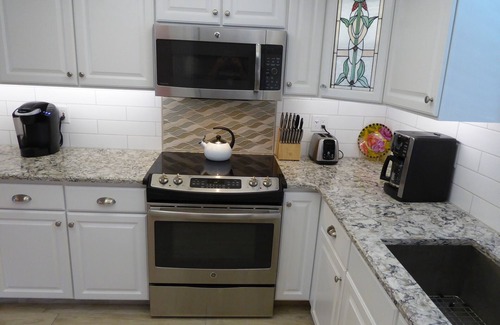 Avon By The Sea Condo | BEACHSIDE Paradise: 3BR Condo with Heated Pool - Steps to Cocoa Beach Pier!