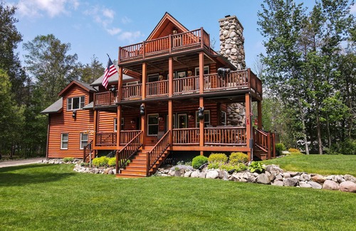 Alanson House | Bear Cabin - Waterfront - Huge Yard + Hot Tub - Peaceful Setting - EV Charger