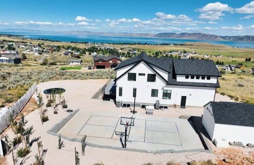 Sweetwater Cabin | Bear Lake getaway for the whole family! Sleeps 32! Beach access included!