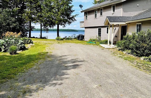 Millinocket House | Beautiful and private lakefront home on the sandy shores of South Twin Lake