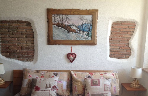 Santa Giustina Apartment | Beautiful Studio "SoleLuna" with garden and views of the Dolomites