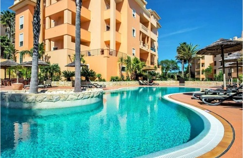Praia da Luz Apartment | Beautiful 1 bed Apt with heated pool/sauna/hot-tub/gym