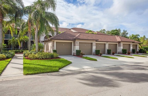 Naples Heritage Condo | Beautiful 1st. floor unit totally renovated with lake view!