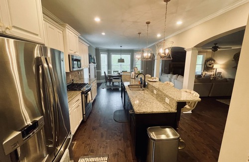 Evans House | Beautiful 4 Bedroom 4 bath Augusta Rental with pool. Amazing back porch views