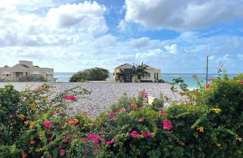 Atlantic Shores Villa | Beautiful, airy 3 bedroom second-floor unit with views of the ocean and pool.