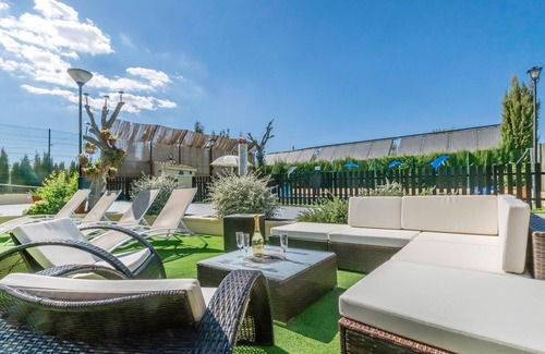 Villanueva del Trabuco House | Beautiful and spacious semi-detached house with heated outdoor pool and solar panels.