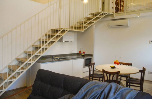 Tignale Apartment | Beautiful apartment with lake and view, courtyard and pool