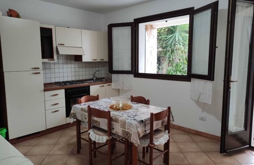Porto Pino Apartment | BEAUTIFUL APARTMENT IN VILLA WITH SEA VIEW