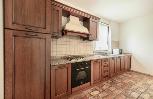 Povoletto House | Beautiful apartment in villa for 4 guests with A/C, WIFI, pool, TV, terrace and pets allowed