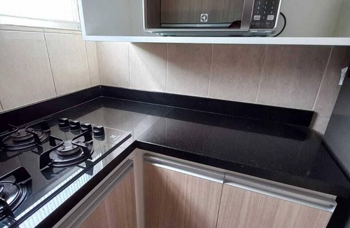 Aparecida Apartment | Beautiful apartment, overlooking the sea at Ponta da Praia with Internet Access