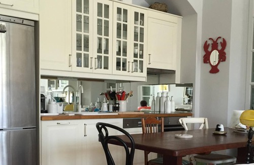 Poros Apartment | Beautiful architect-renovated residence located directly on the port of Poros.