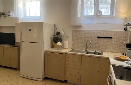 Stoupa Apartment | Beautiful Basement Apartment with Private Terrace