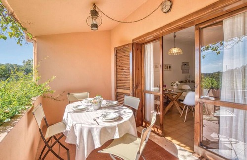 Porto Istana Apartment | Beautiful bay of white sand and clear sea opposite the island Tavolara