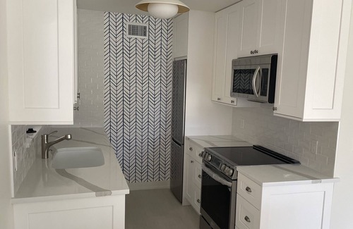 Moorings Condo | Beautiful bayfront condo in paradise directly across from beach with boat dock