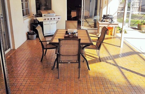 Villa De Palmas House | Beautiful Beach Style Home by Port Canaveral w/Private Salt Water pool