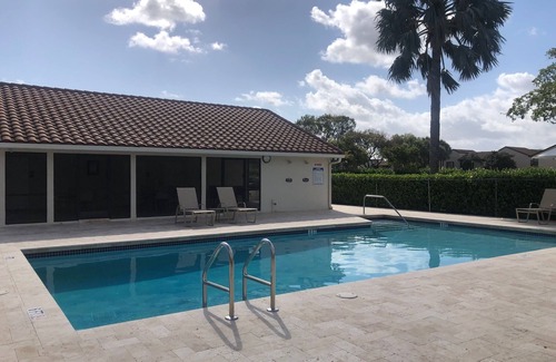 Hamptons at Boca Raton House | Beautiful Boca Home for Snowbirds & Families enjoy the pool pickleball & tennis
