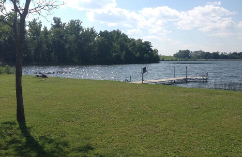 Alexandria House | Beautiful cabin with level lot on Maple Lake. Sunset views on the point!