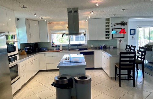 Whispering Pines House | Beautiful Canal Front Heated/Chilled Pool 4 Bdr Home