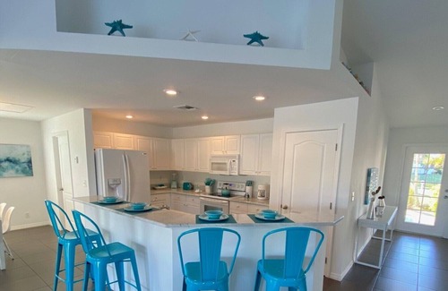 Trafalgar House | Beautiful Cape Coral Home, Outdoor Oasis with Heated Pool on a Freshwater Canal!