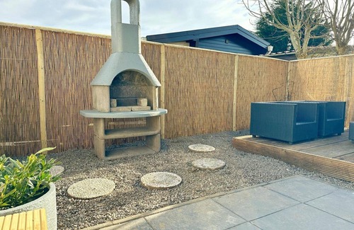 Sint Maarten House | Beautiful chalet with a lovely enclosed garden and BBQ to relax in after a day at the beach with your dog.