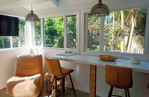 Kiama Apartment | Beautiful eclectic studio with lush private garden and solar heated pool