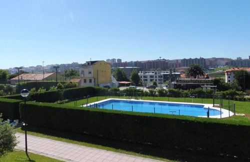 Santander Apartment | Beautiful ground floor with garden, pool and close to the beach, idela families