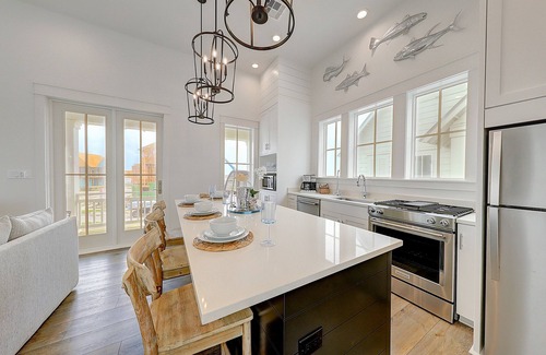 Port Aransas Cabin | Beautiful home with pools, golf, fitness area, washer/dryer, & WiFi