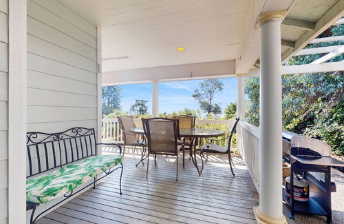 Indianola House | Beautiful home with foosball table, waterfront views, fireplace, basketball cour
