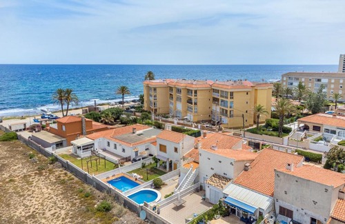 Punta Prima Ski Chalet | Beautiful house with sea views and private pool