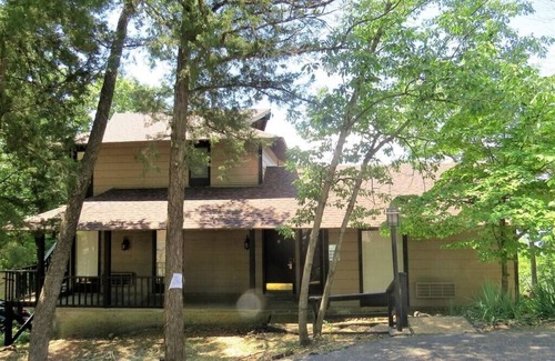Osage Beach House | Beautiful lake front sunset view, you can hear waves crashing against the bluff