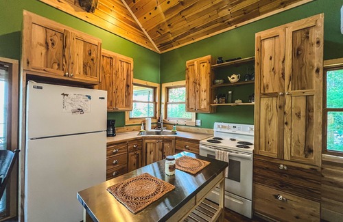 Gould City Cottage | Beautiful Lake House With Outdoor Firepit and Great Fishing!