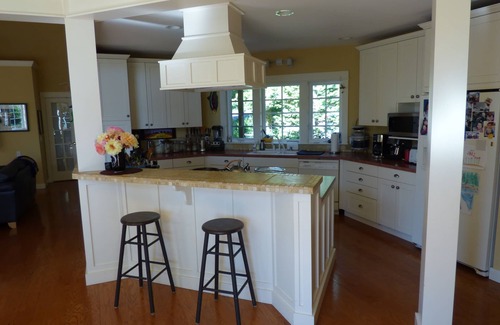 Silver Beach House | Beautiful lake-view home. Gourmet kitchen, comfortable inside and out.