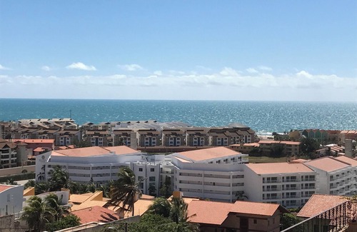 Porto das Dunas Apartment | Beautiful luxury apartment, 3 suites, 55" TV, swimming pools, air conditioning, complete, 400m from the beach, cond.