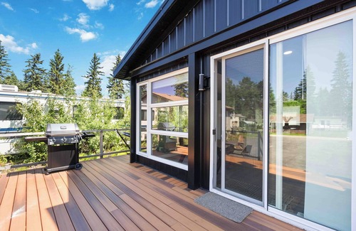 Central Alberta House | Beautiful Modern Lakehouse with partial lake view