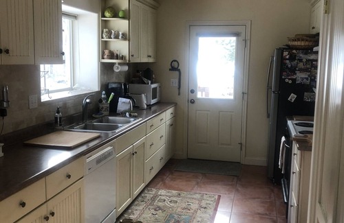 Garden Valley House | Beautiful mountain home with hot tub over looking Scriver Creek meadow.