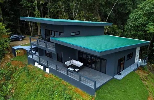 Ballena House | Beautiful new home with wrap around views of the ocean and two waterfalls