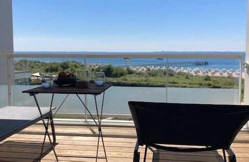 Pelzerhaken Apartment | Beautiful newly built vacation apartment with its own sauna, sea view and e-charging station