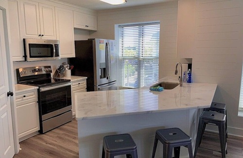 Isle of Palms Condo | Beautiful Oceanfront 4BR Condo in the Heart of IOP with Pool.