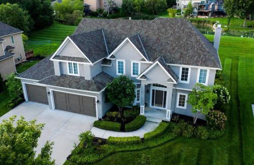 Overland Park House | Beautiful relaxing private villa next to a pond smart home and Traeger Grill