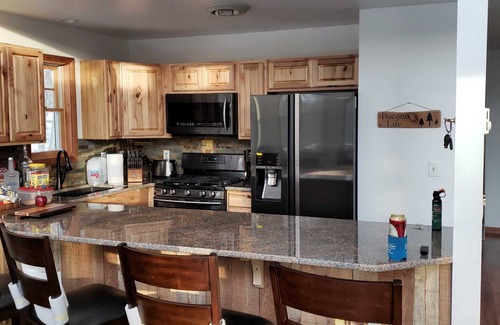 Bushkill Ski Chalet | Beautiful remodeled property Mt. Top view scenic stream in back on a cul de sac.