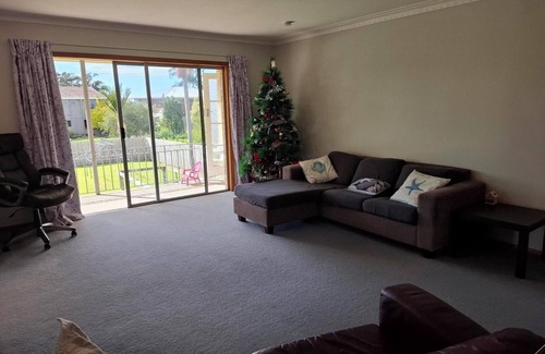 Ruakaka House | Beautiful Ruakaka beach fun, lots of space, 2 lounges, big garden