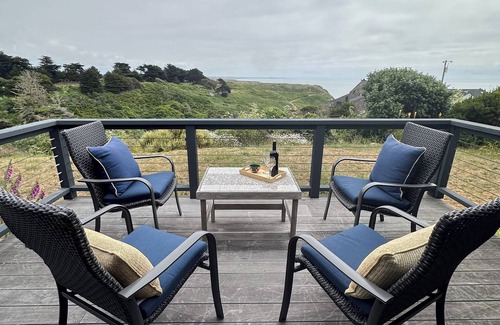 Manchester House | Beautiful single story home with lighthouse and panoramic ocean views.